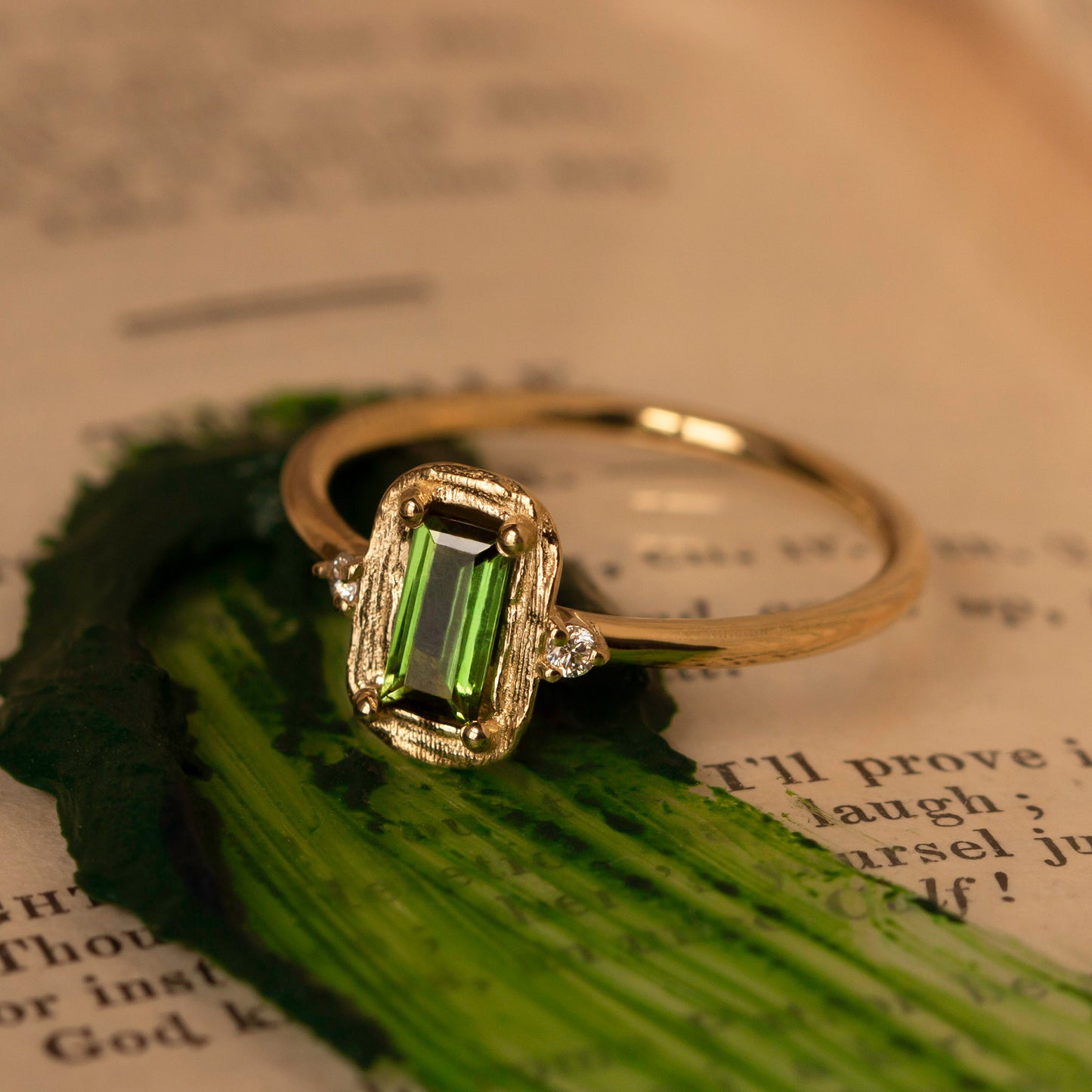 For the holidays, the Sap Green has been reimagined with a rich cranberry-red garnet, while still featuring the signature velvety brushstroke-textured halo and two round brilliant-cut white diamonds. Which would you choose: the classic Sap Green with a green tourmaline or the festive Cranberry Red?
painting, painter's palette, artist, painting knife