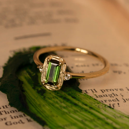 For the holidays, the Sap Green has been reimagined with a rich cranberry-red garnet, while still featuring the signature velvety brushstroke-textured halo and two round brilliant-cut white diamonds. Which would you choose: the classic Sap Green with a green tourmaline or the festive Cranberry Red?
painting, painter's palette, artist, painting knife